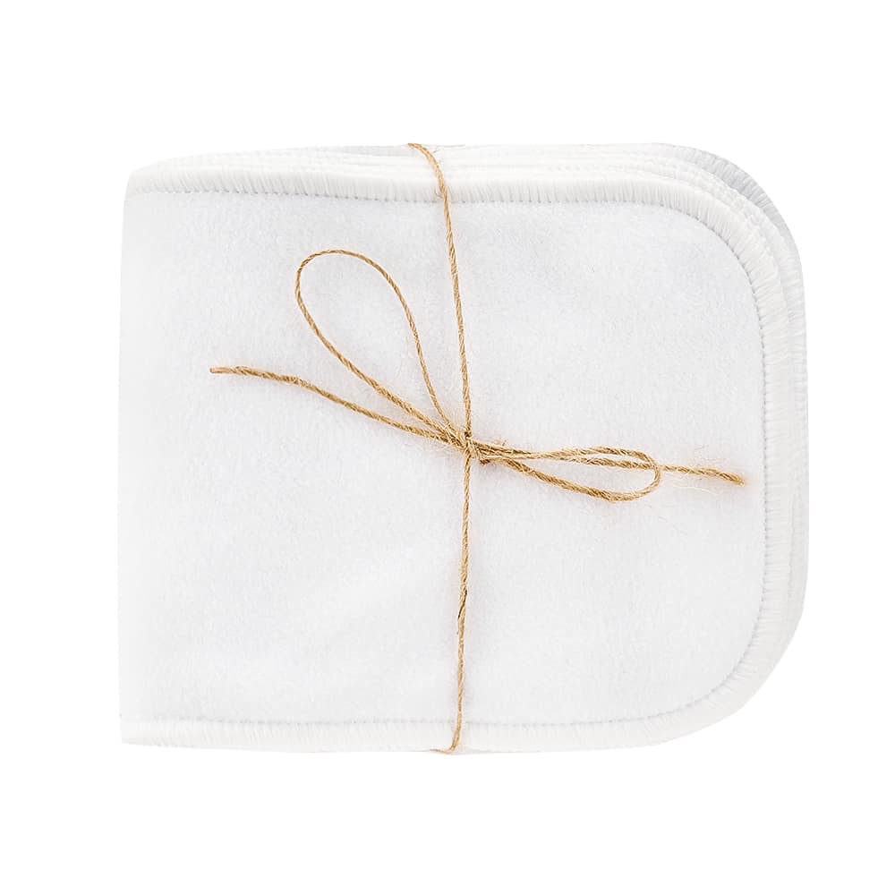 Image of white boom liners tied up with a piece of twine.