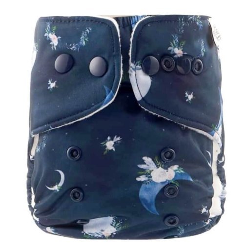 Newborn Nappy with a moon and flower print.
