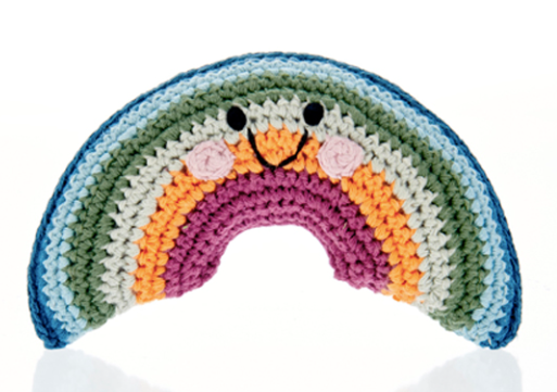 Image of a hand crocheted rainbow toy.