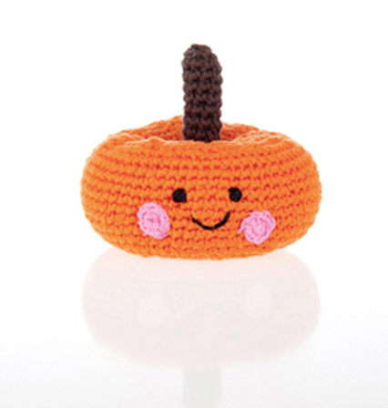 An image of a hand crocheted pumpkin rattle.