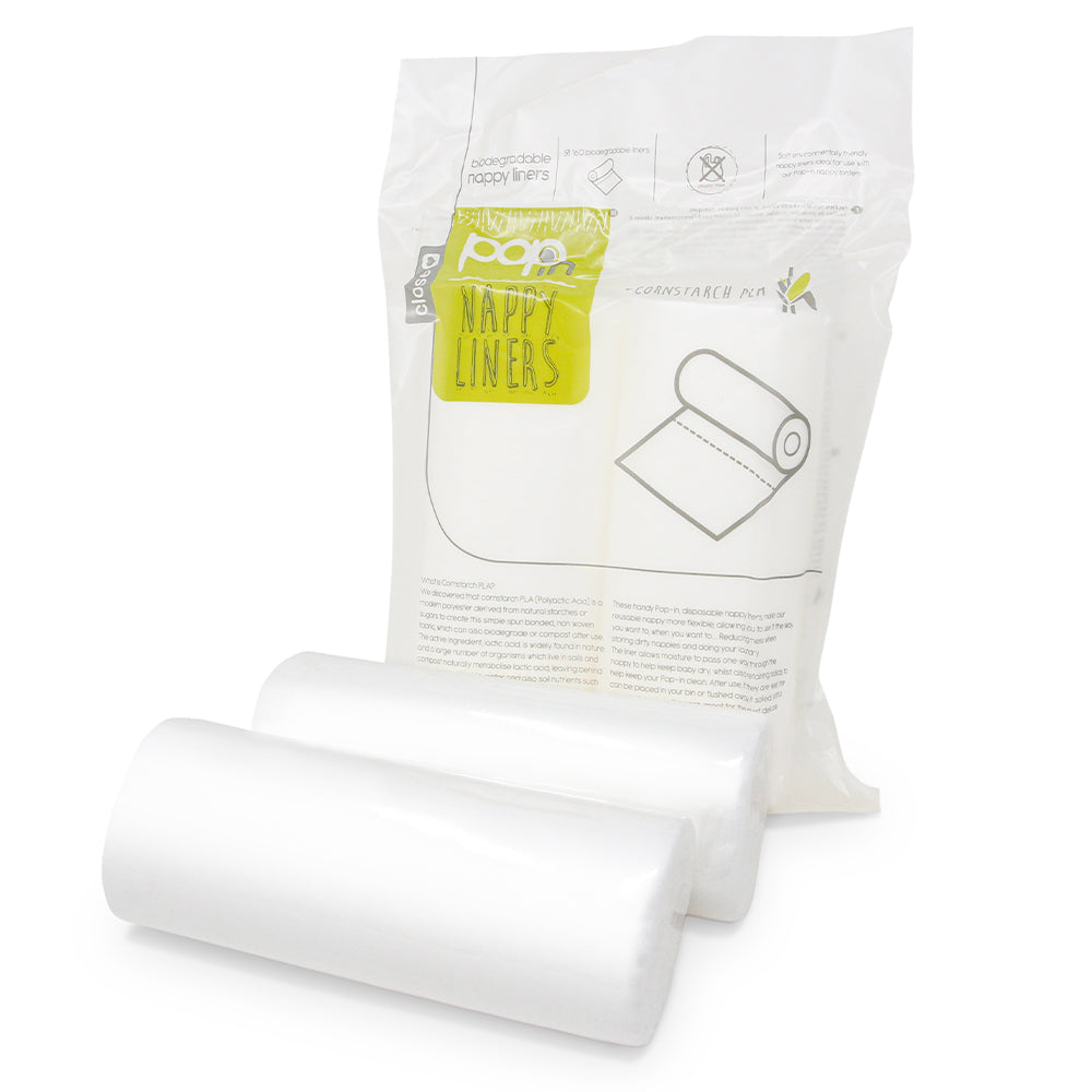 Image showing the package and two rolls of disposable nappy liners.