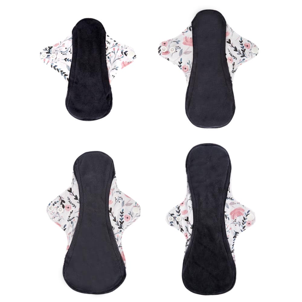 image shows the inside of 4 different sized reusable sanitary pads.