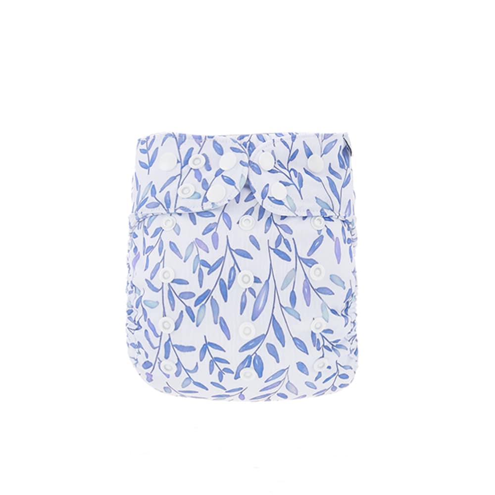 Reusable cloth nappy showing a blue leaf pattern.