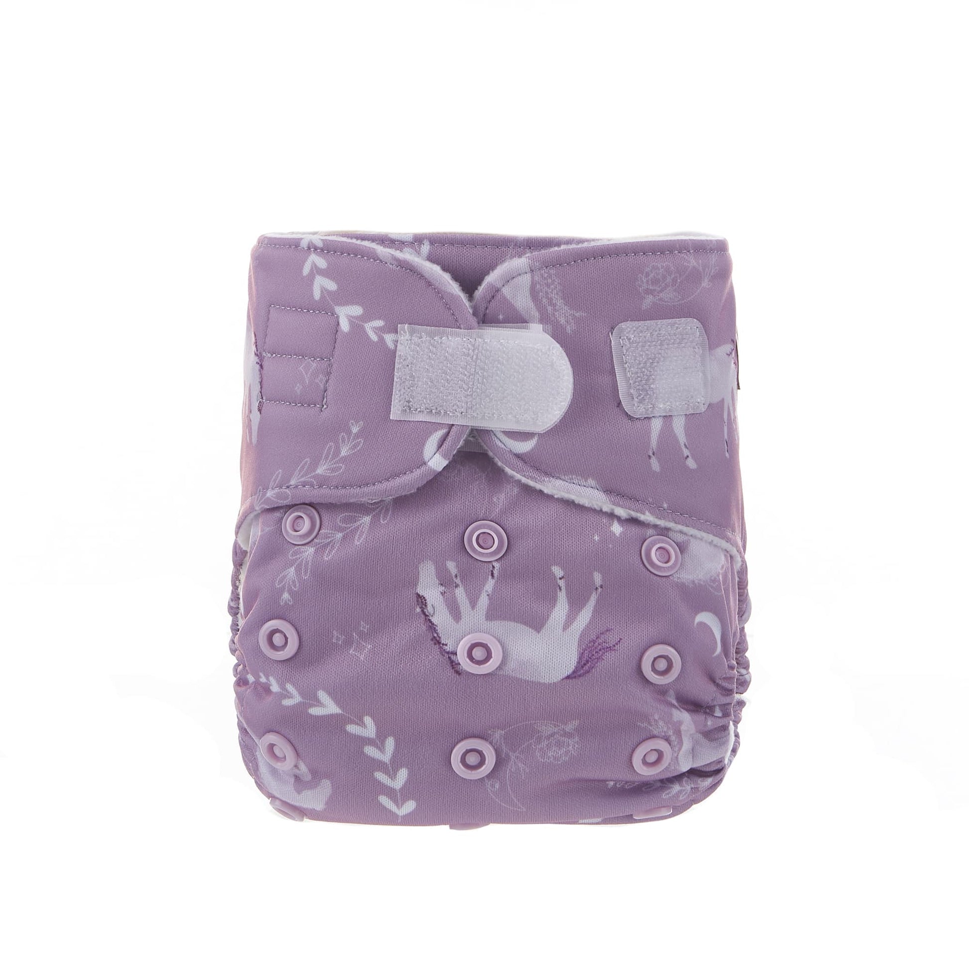 Newborn nappy with velcro fastening and pink horse pattern.