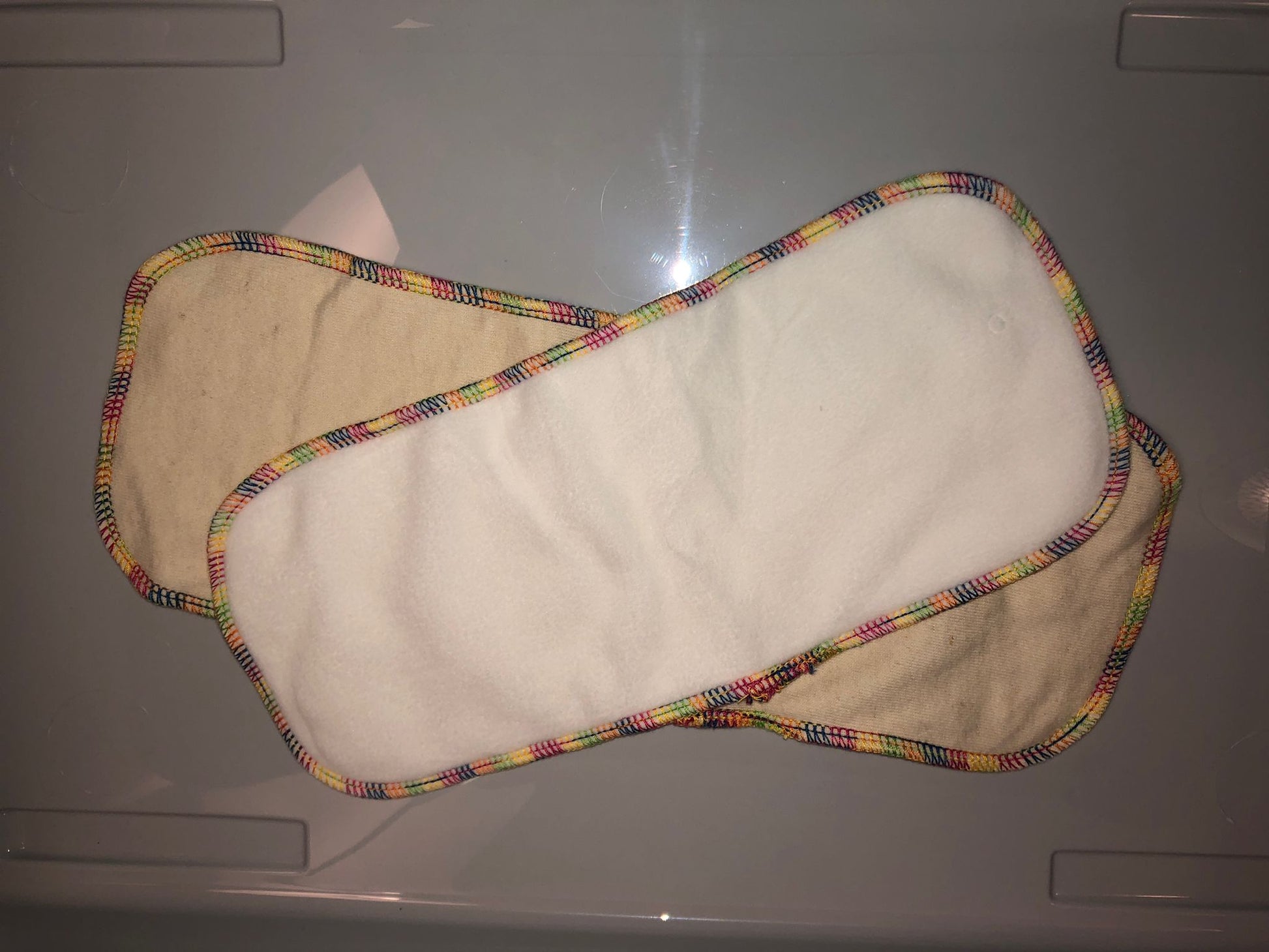 An image showing the two boosters that come with the fitted nappy.