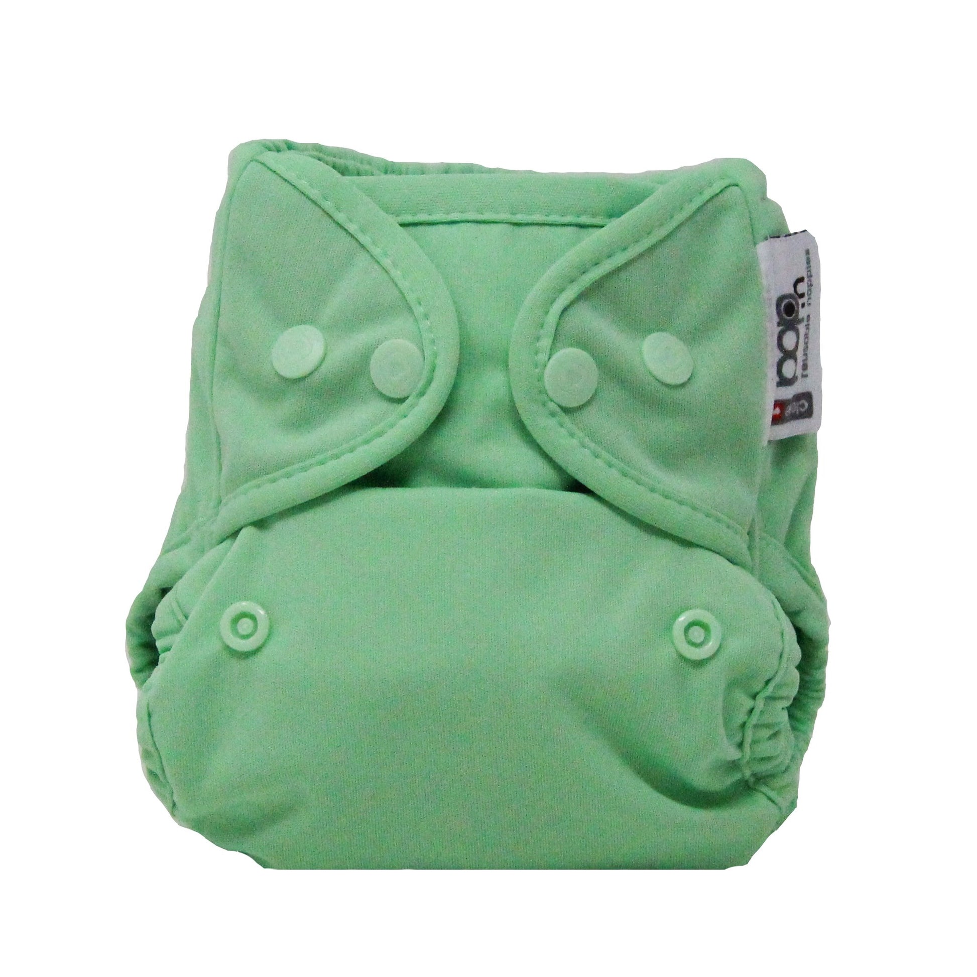 Image shows a pale green reusable cloth nappy with popper fastening.